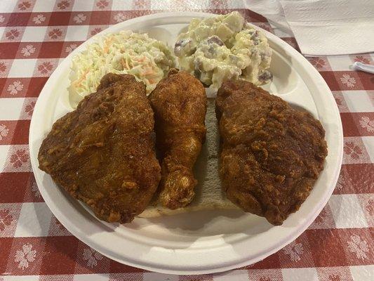 Three piece dark with potato salad and Cole slaw.