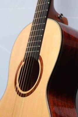 This Merida Parlor Guitar sounds amazing. We have the prototype; the original from which the line was duplicated!