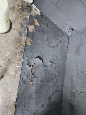 This is the floor of the firebox where the black paint is chipping off.