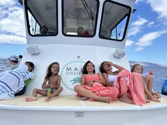 Happy kids on the way back from snorkeling