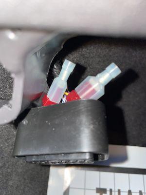 OBD port that's broken from its mount due to improper removal.