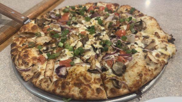 Chicken and Garlic Gourmet Medium Pizza.