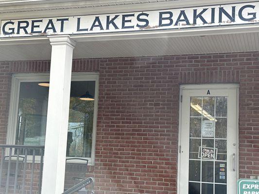 New paper sign on door. Not Great Lakes anymore but still a baking company. Now called Awaken bake Company.