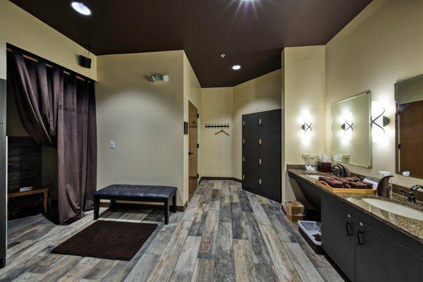 A look inside our Women's Changing Area, where we offer every guest a robe and spa sandals to change into prior to your massage or facial.