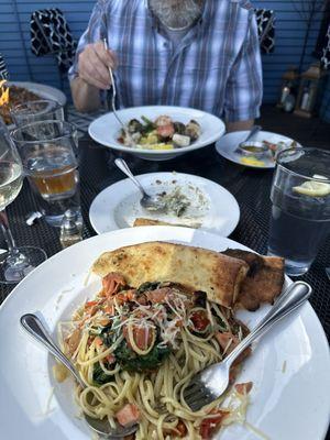 Our meals: Smoked Salmon Linguini and Cedar Plank Seaford Platter with the Spinach Artichoke Dip appetizer.