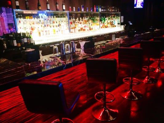 The red lighting illuminates the bar with sexiness (not to mention the beautiful bartenders).