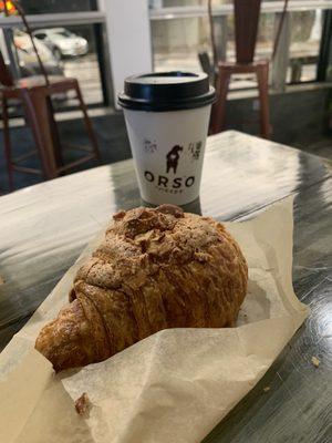 Croissant with almonds and then espresso with coconut milk delicious