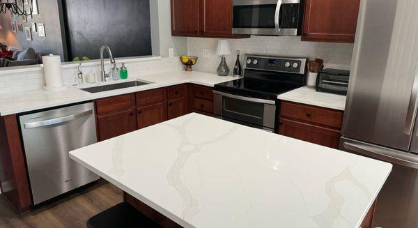 Discover why Calacatta Gold quartz is a must-have for your kitchen!  Explore the latest buzz in quartz countertops. #QuartzTrends