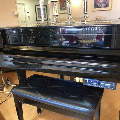 Grand Piano in the Entrance Level common area