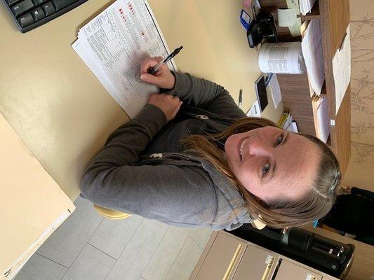 Office associate Michelle handles front desk for Flossmoor office.