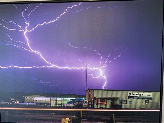 A cool photo inside the office of a storm during monsoon season.    No propane during these hours .