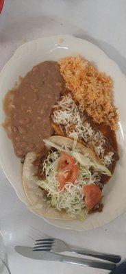 Carnitas taco and beef enchiladas combo