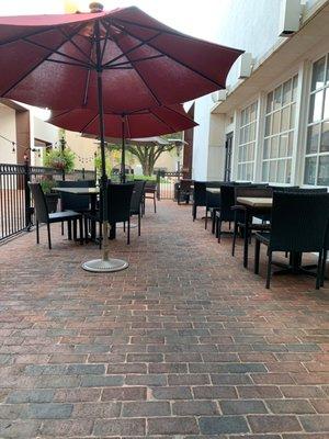 Outdoor patio, so cute and distanced.