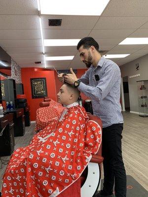 Brother getting his haircut