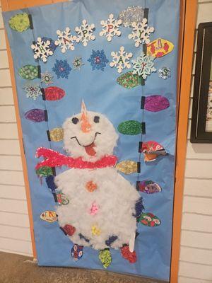 One of the many cute door-decorating projects they do throughout the year.