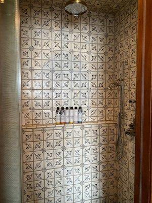 Shower with the most exquisite tiles! And cowshed products.