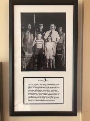 A picture and an autographed photograph by Walt Disney who stayed here in the 1950's.