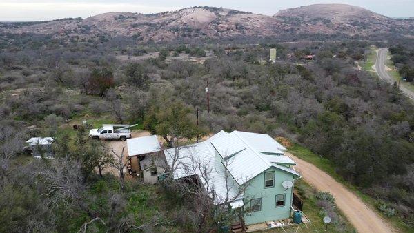 New Standing Seam with Enchanted Rock next door