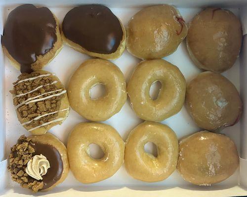 Chocolate, Biscoff, Original, and Raspberry donuts