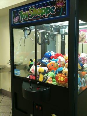 Claw machine near the lounge.