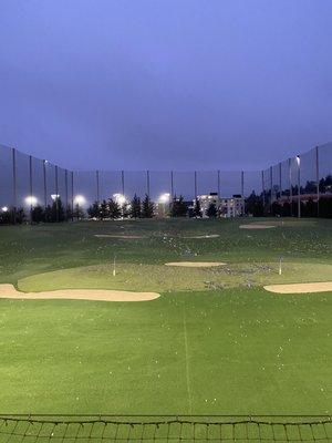 Driving range at night.