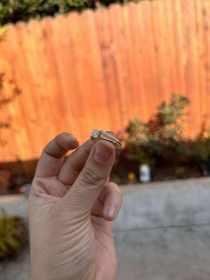 Wedding band and engagement ring, cleaned and welded together.