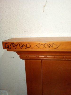 Both bed headboards graffitied