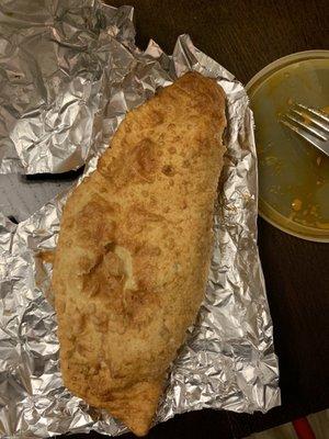 "Aloo paratha"? aka Sad Empanada, aka Limp Samosa, aka Samponada? Empamosa? It's not a paratha. At all.