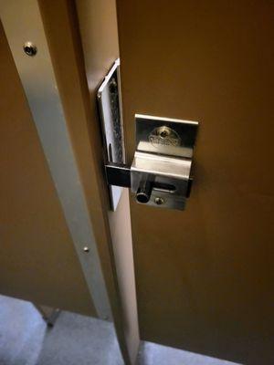 Broken lock in the handicapped accessible bathroom stall