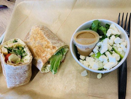 Souvlaki wrap with cucumber salad on wheat wrap