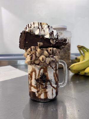 Cookie Doughlicous extreme shake, topped off with our cookie dough cheesecake