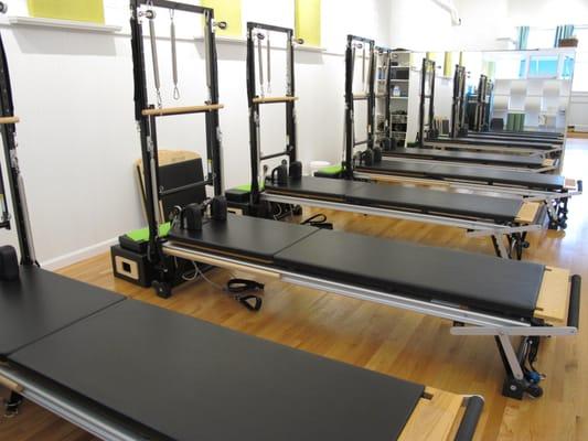 Our Reformer Room features 5 STOTT V2Max Reformers with towers!