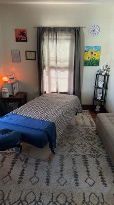 Massage Table. Salt Lamp. Framed Massage Certificate. Bench. Paintings. Clock.