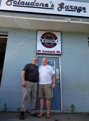 Owner and State Representative outside the shop