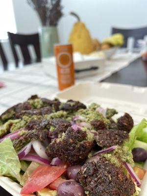 Falafel Salad with barely any dressing.