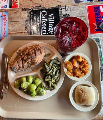 Fried Chicken thigh, green beans, Brussels sprouts, candied yams, sweet tea