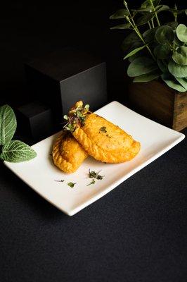 Empanada Appetizer - our empanadas change every week, ask your sever for the flavor of the week!