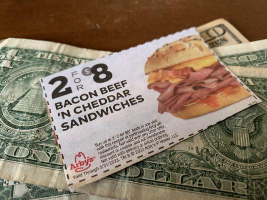 Coupon for two bacon, beef, and cheddar sandwiches.