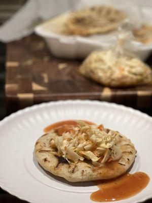 Pupusa plated at home.