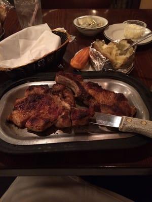 Pork chops and baked potato