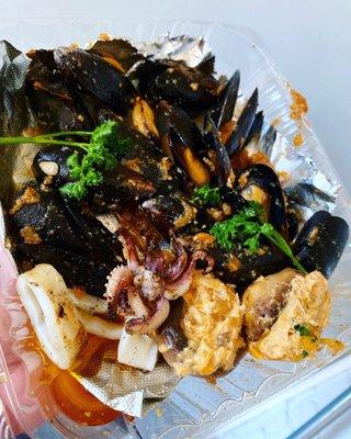 Chilean Mussels,  Grilled calamari, & Crab stuffed mushrooms