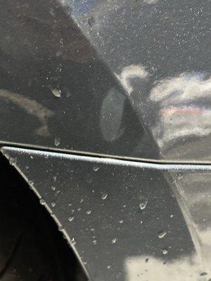 Large dent on the passenger rear quarter panel