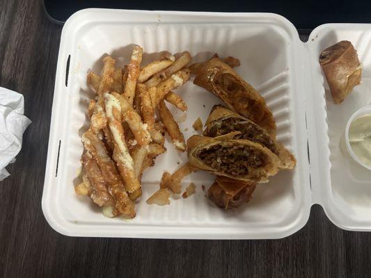 Lunch Special (Korean Beef, Mac n Cheese, Chicken Enchilada) plus fries. (PS, took photo after digging in so there was more!)