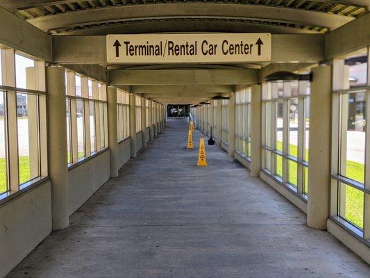 Walkway to the Rental Car Center from parking lot.