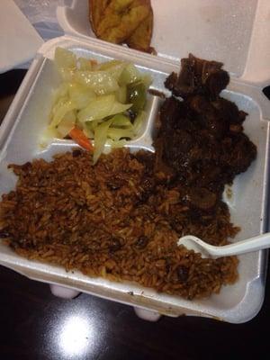 Oxtails, rice and peas, cabbage, and plantains! Delicious!