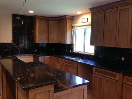 Matrix Motion exotic kitchen granite countertops with full granite backsplash in Franklin, MI.