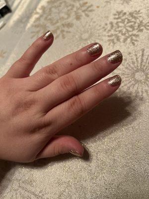 Beautiful manicure with gel nail polish on top.