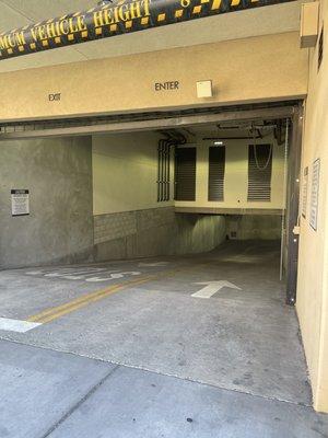 Broken parking garage entrance gate open for over 2 months now