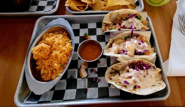 Fish tacos and seasoned rice! Soooo yummy and flavorful!