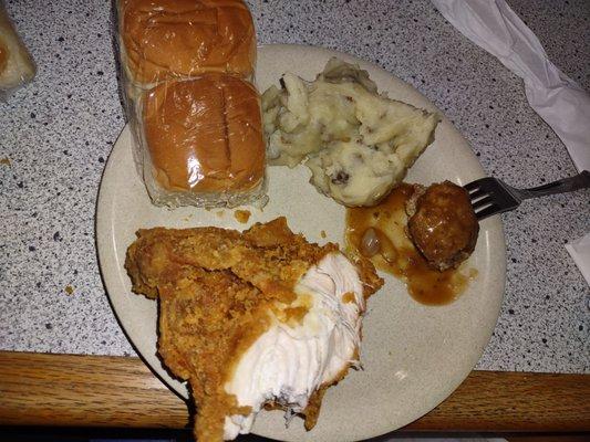 Fried chicken, mashed potatoes and beef and gravy.